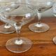5 champagne glasses with flower decoration