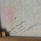 Still life with wine and painting, signed