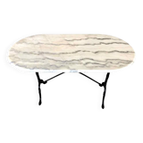 Oval marble and cast iron bistro table