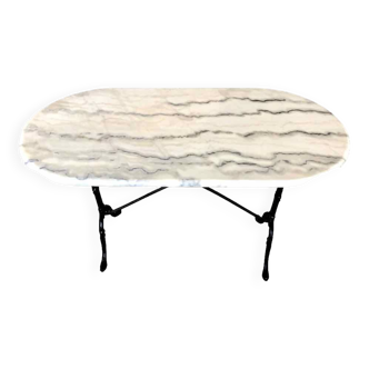 Oval marble and cast iron bistro table