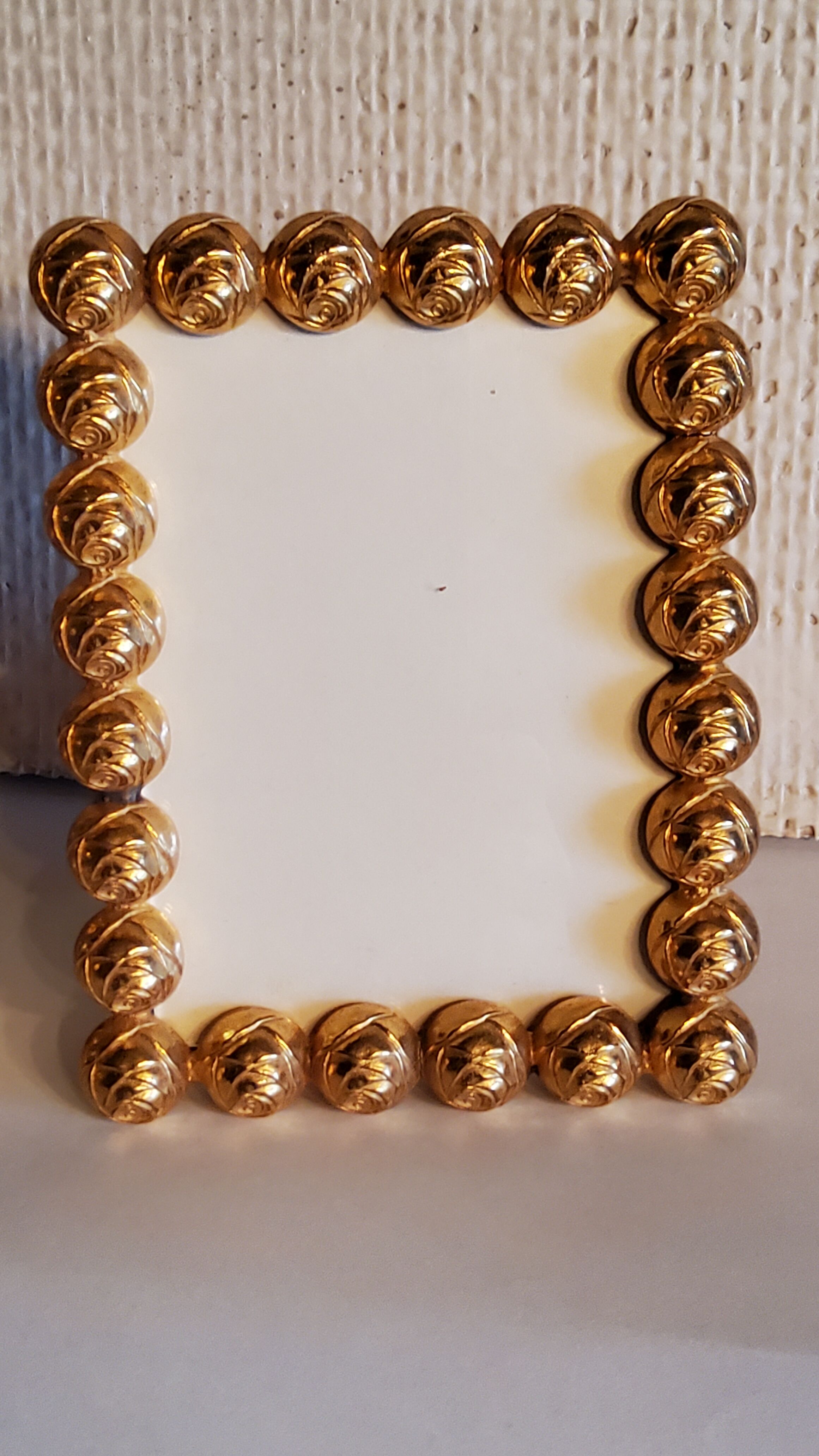 Pair of art deco photo frames in gilded bronze and gilded brass