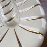White and gold ceramic plate