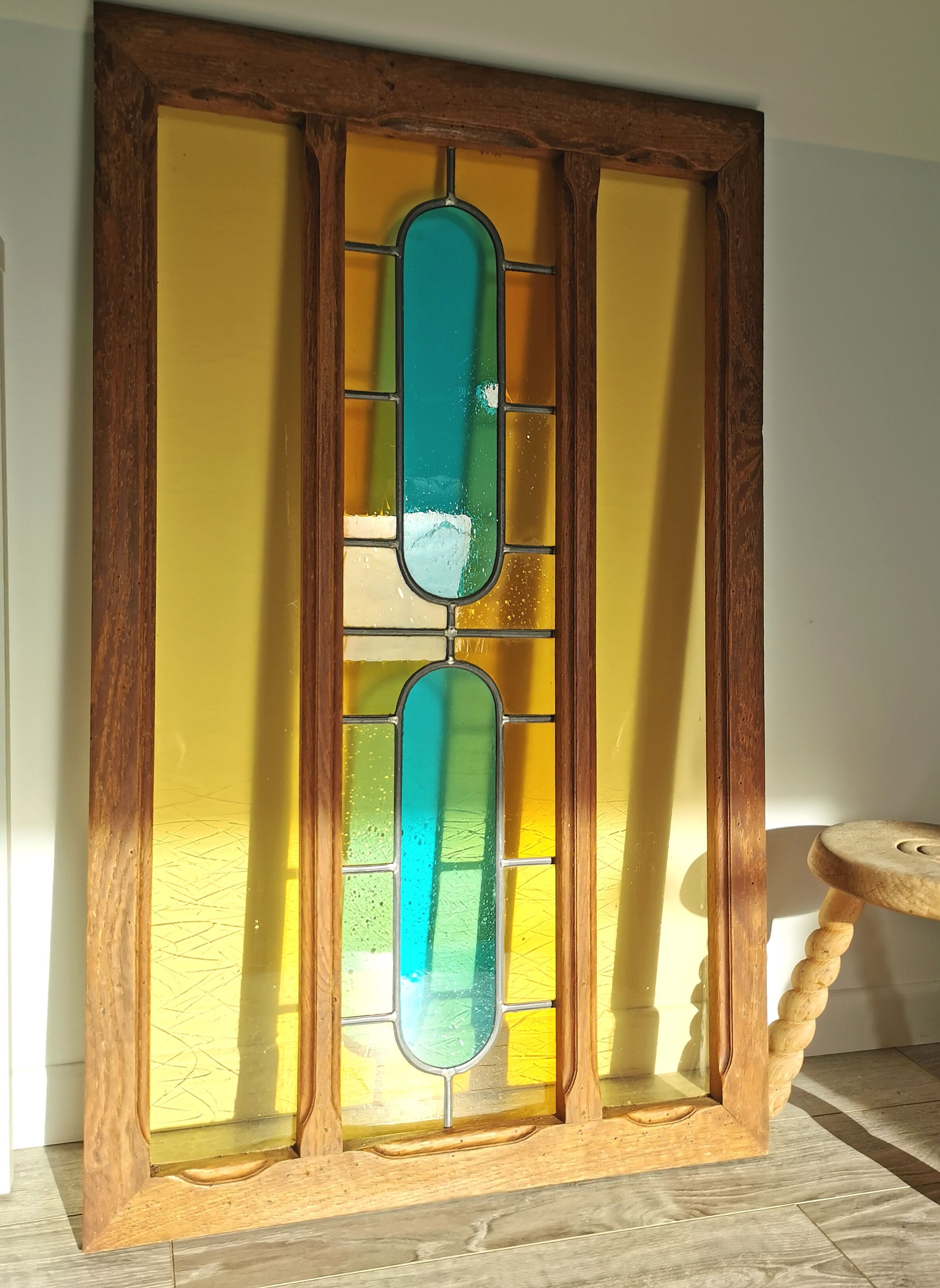 Stained glass window with framing