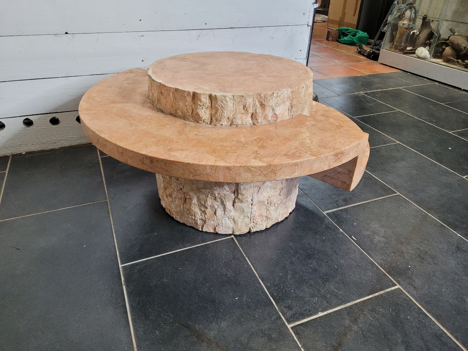 Round stone coffee table by Magnussen Ponte