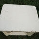 Old white wooden peestal table in art deco style
