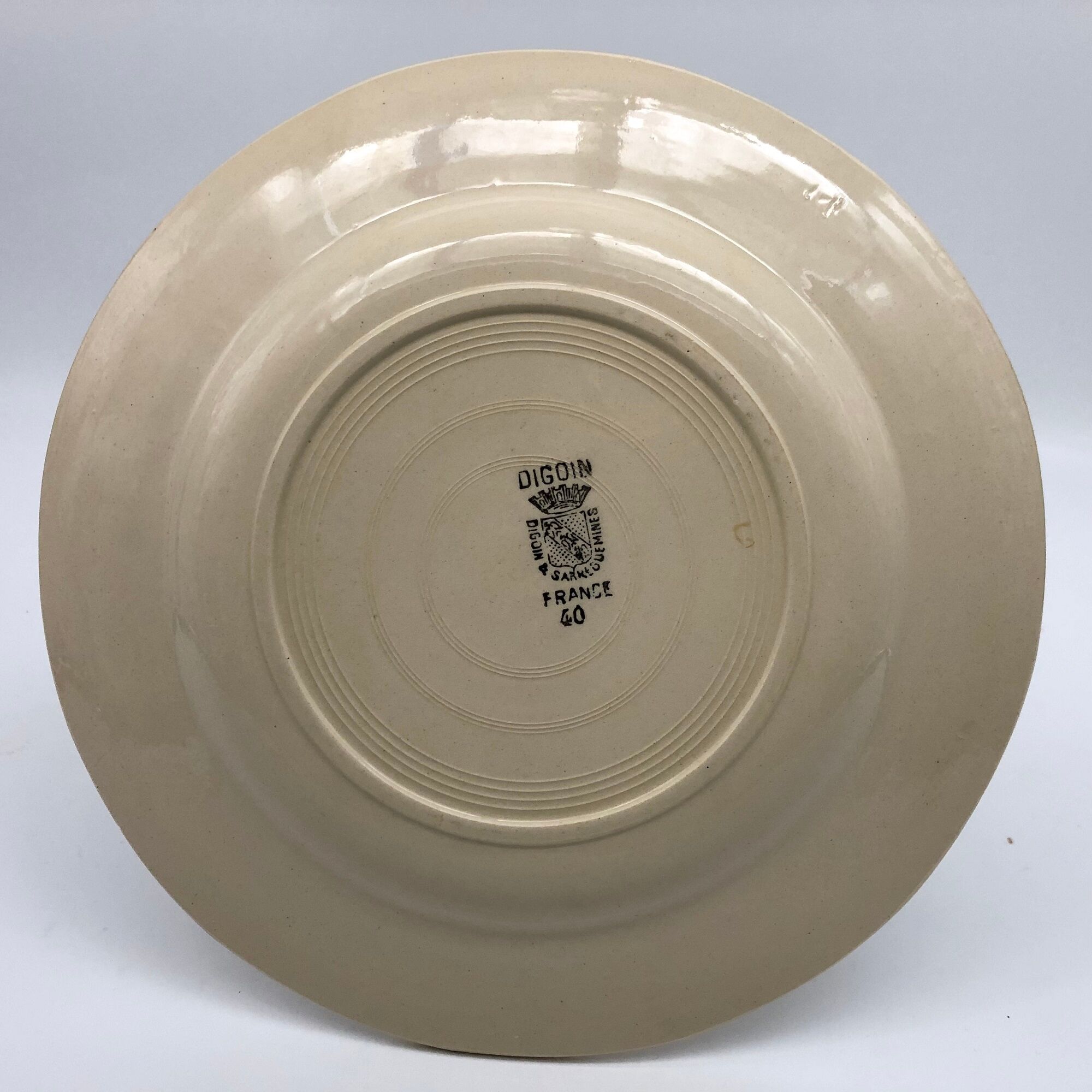 6 earthenware plates stamped "digoin sarreguemines"