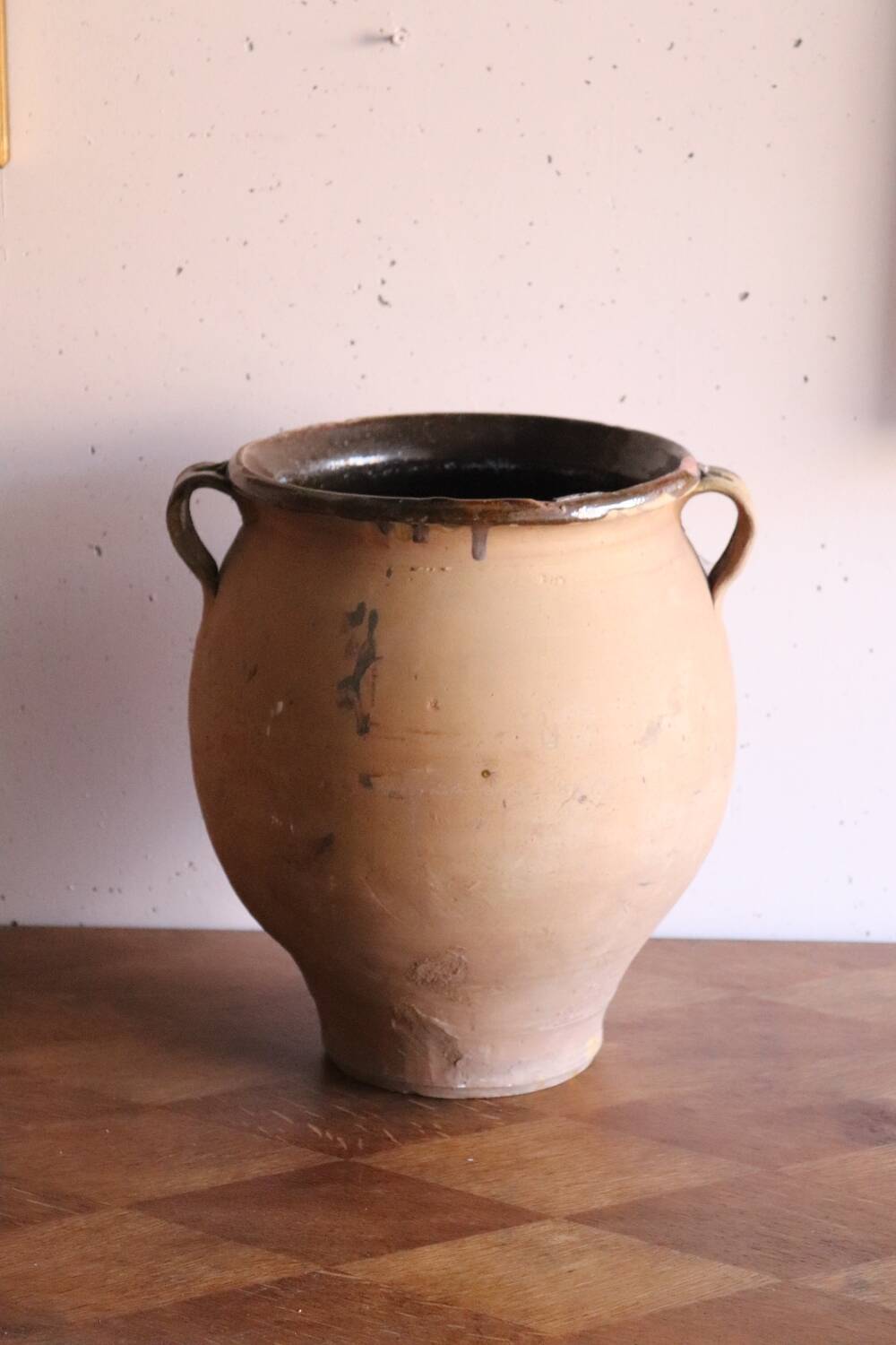 Old glazed terracotta olive jar