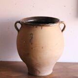 Old glazed terracotta olive jar