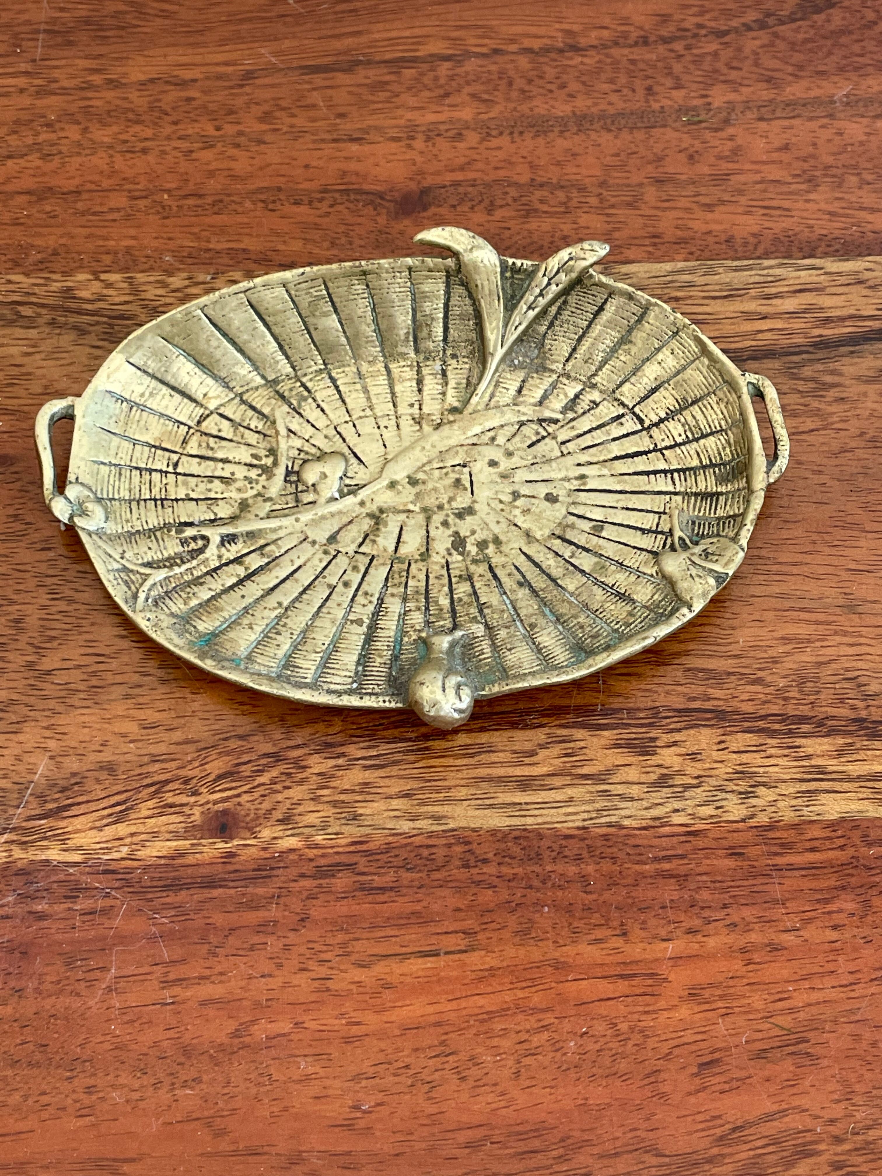 Empty brass snail pocket