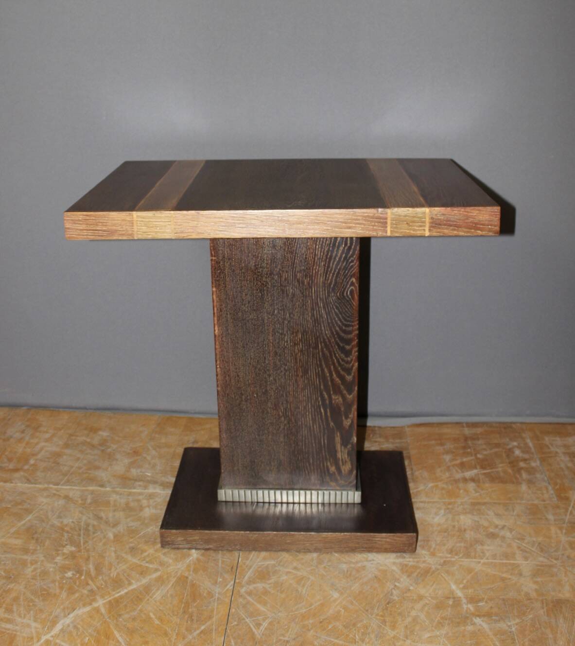 Art Deco period pedestal table in oak and nickel-plated bronze circa 1930