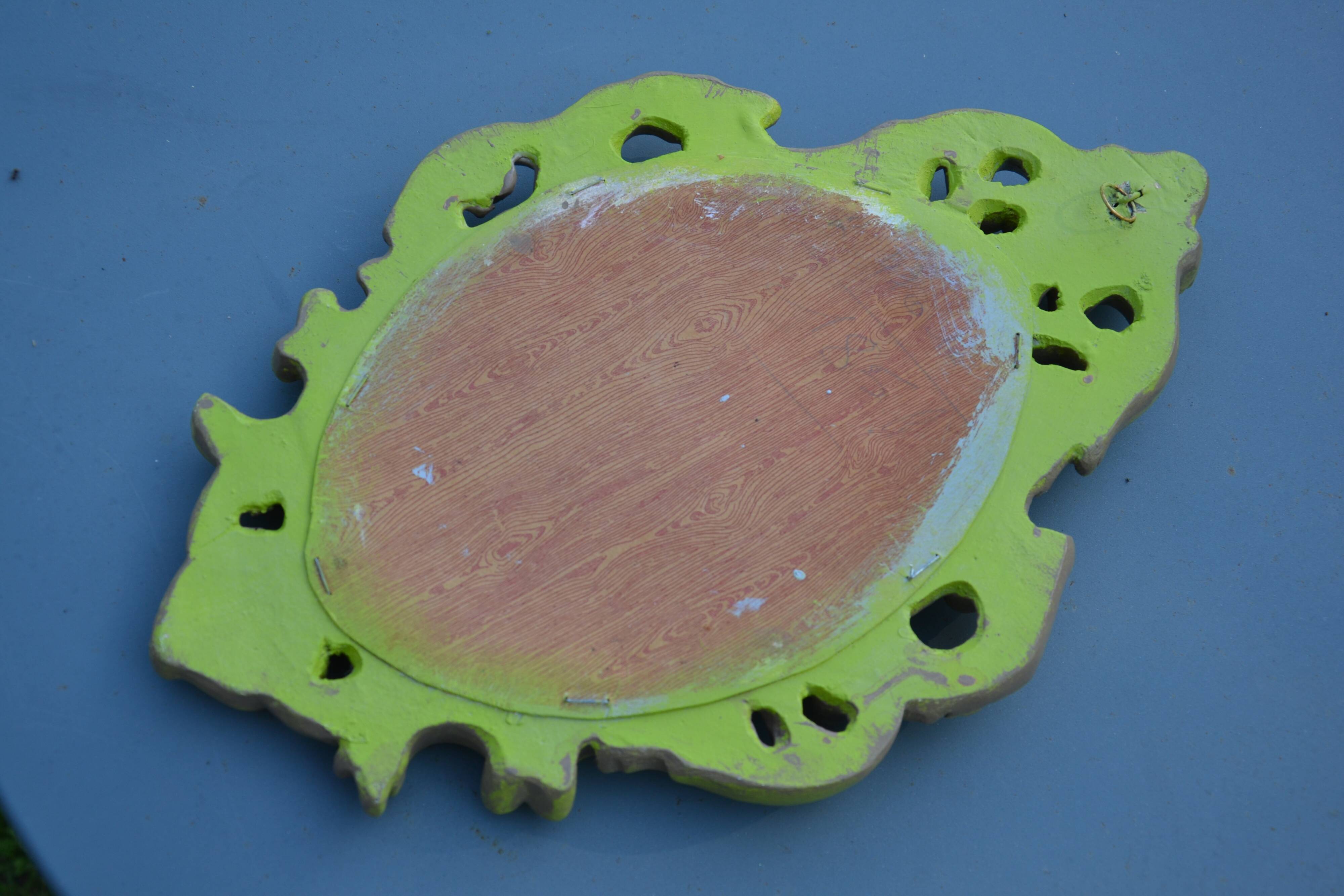 Small green wooden mirror
