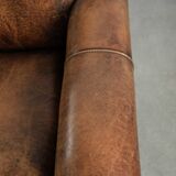 Set of two sheepskin Art Deco design armchairs with beautiful patina