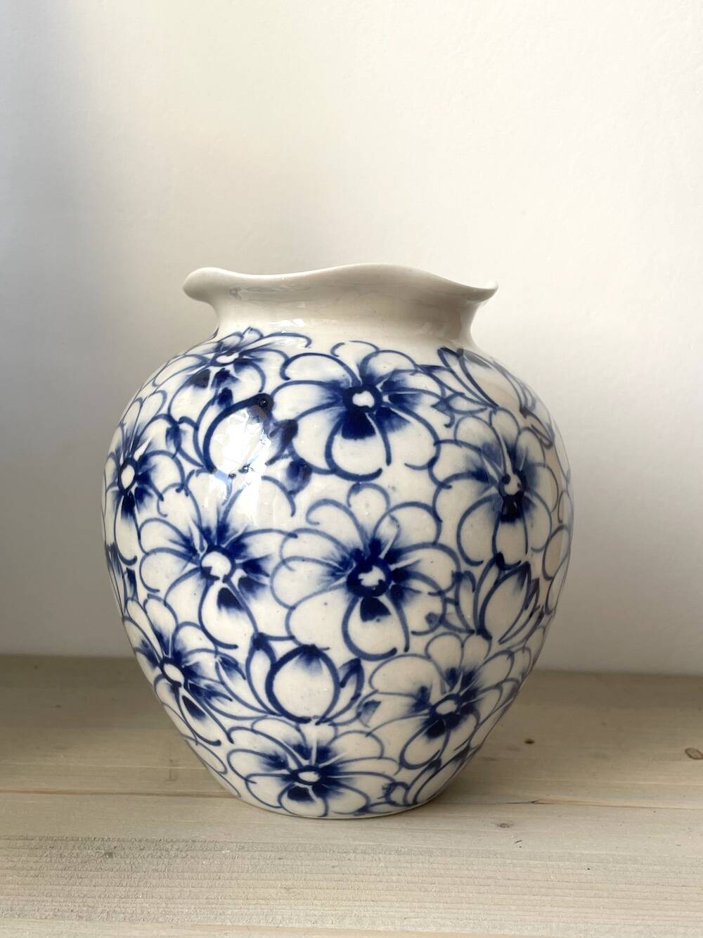 White and blue ceramic vase