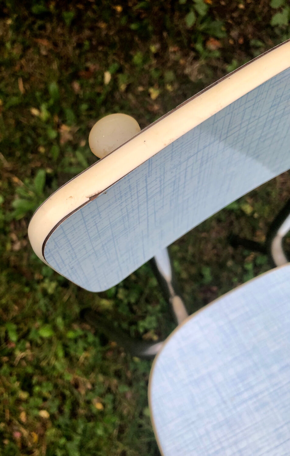 2 blue formica chairs