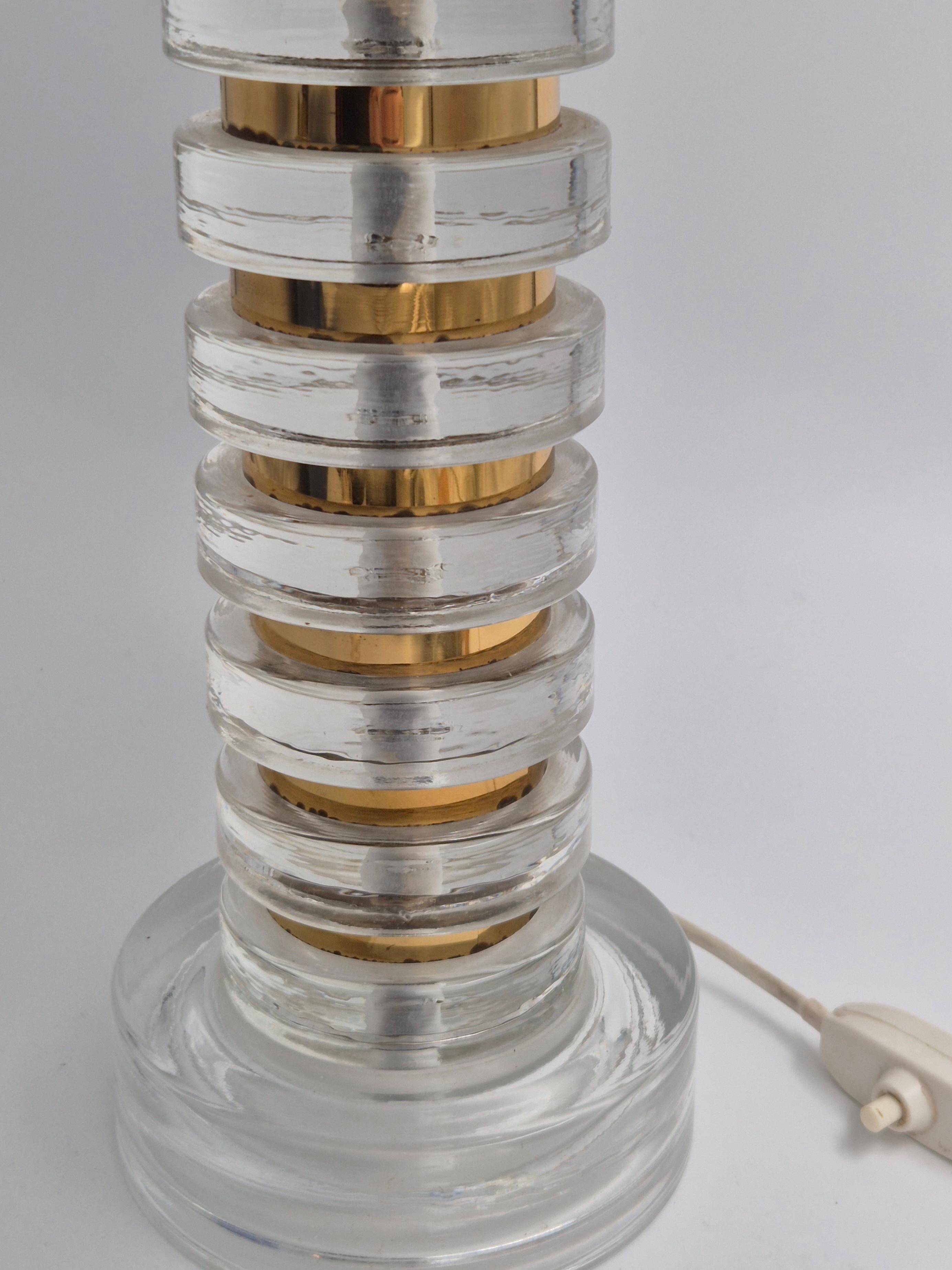 The Modern Scandinavian / Midcentury Modern table lamp with Orrefors glass and brass.