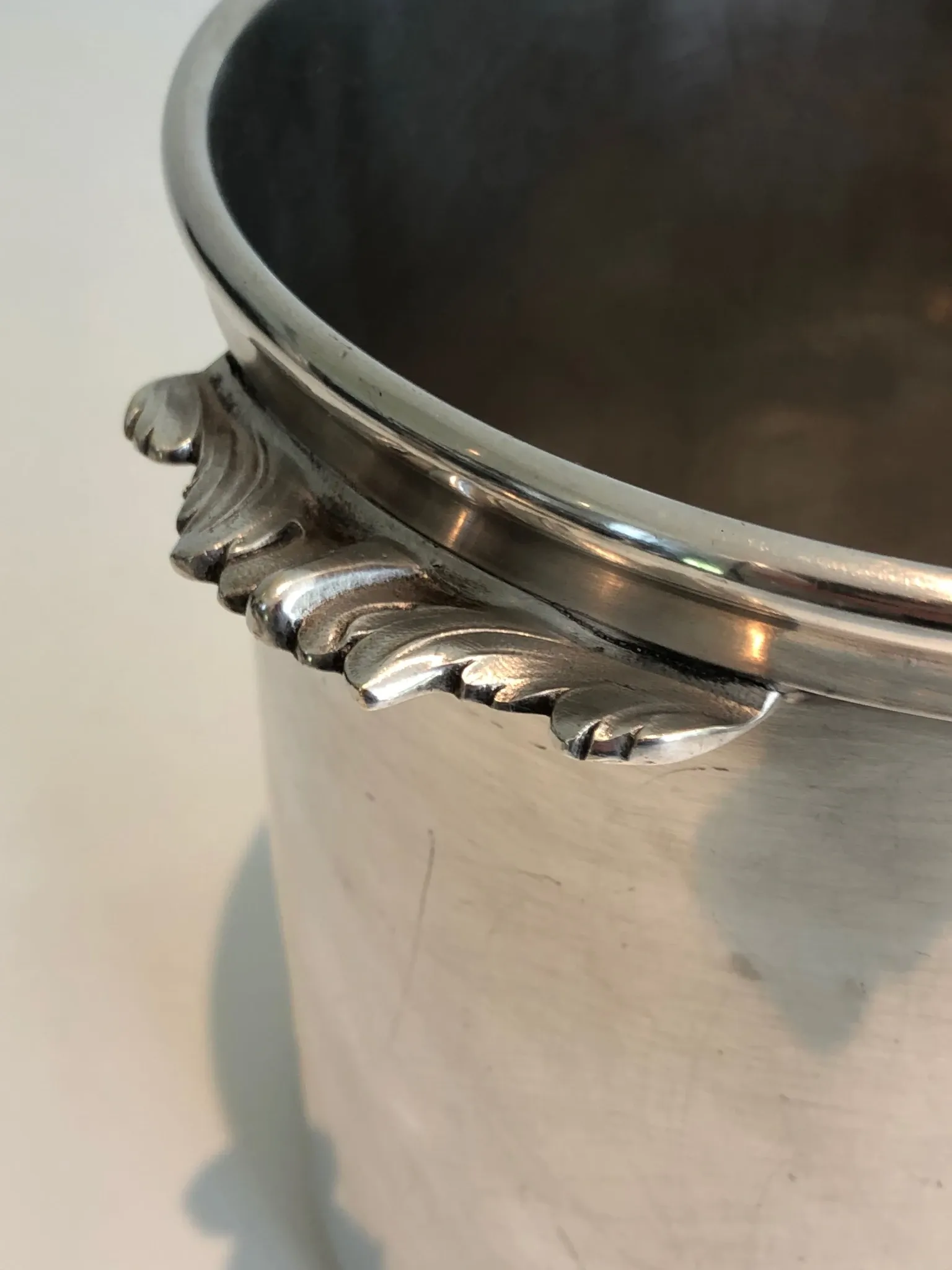 Cylindrical Silver-Plated Champagne Bucket with Small Leaf-Shaped Handles.