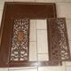 Pair of cast iron door grilles with its coat