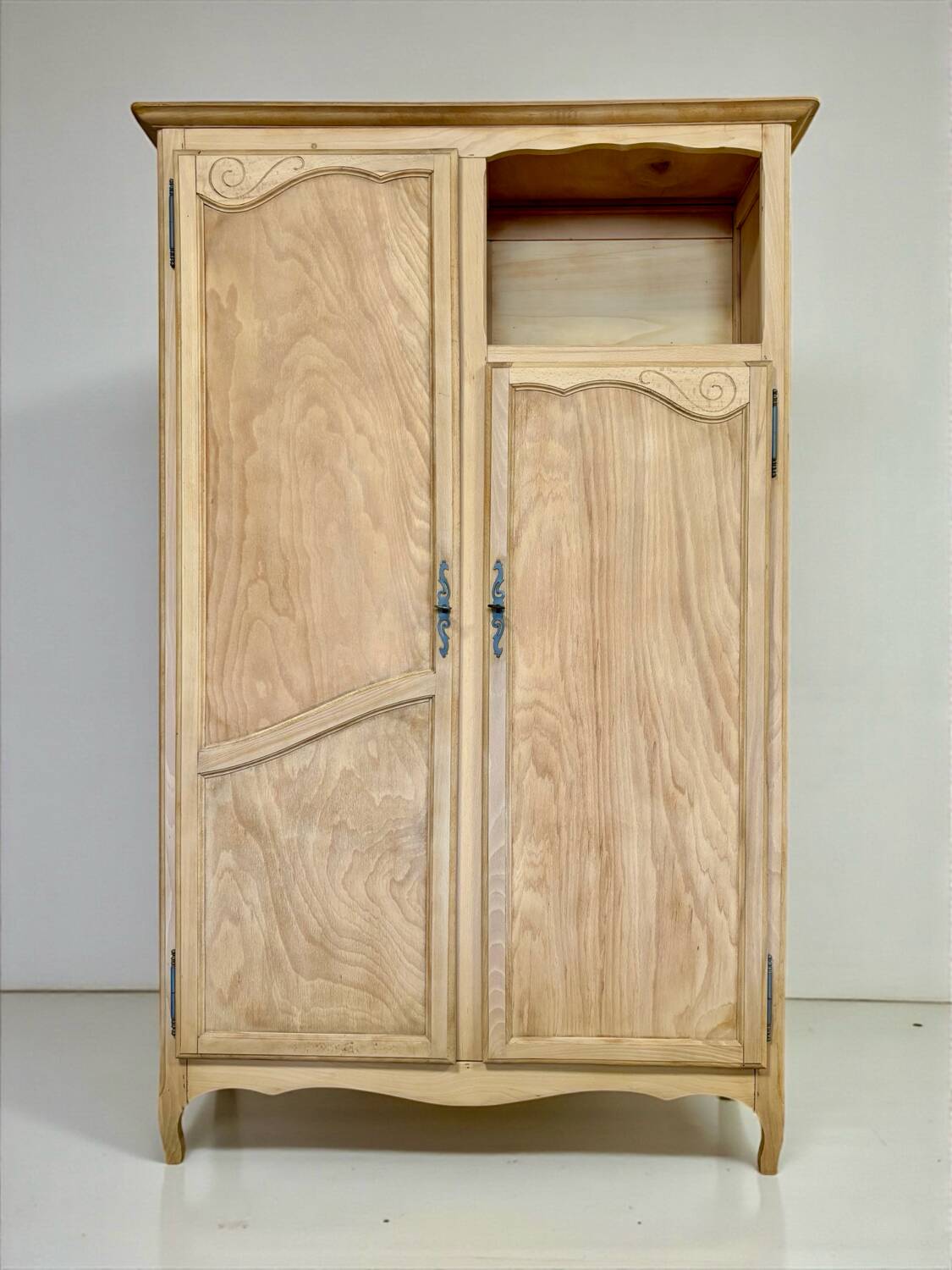 Renovated antique wardrobe – natural wood & sage green interior