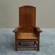 Antique solid oak armchair, 19th-century farmer style.