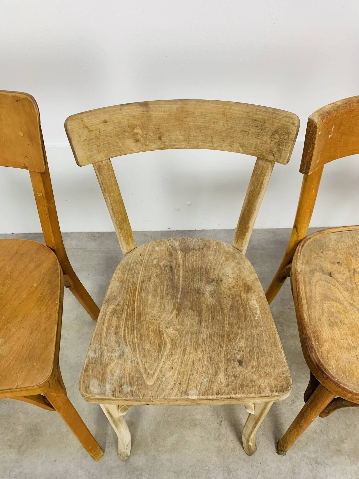 6 mismatched Baumann & Luterma bistro chairs, wood, 1960s