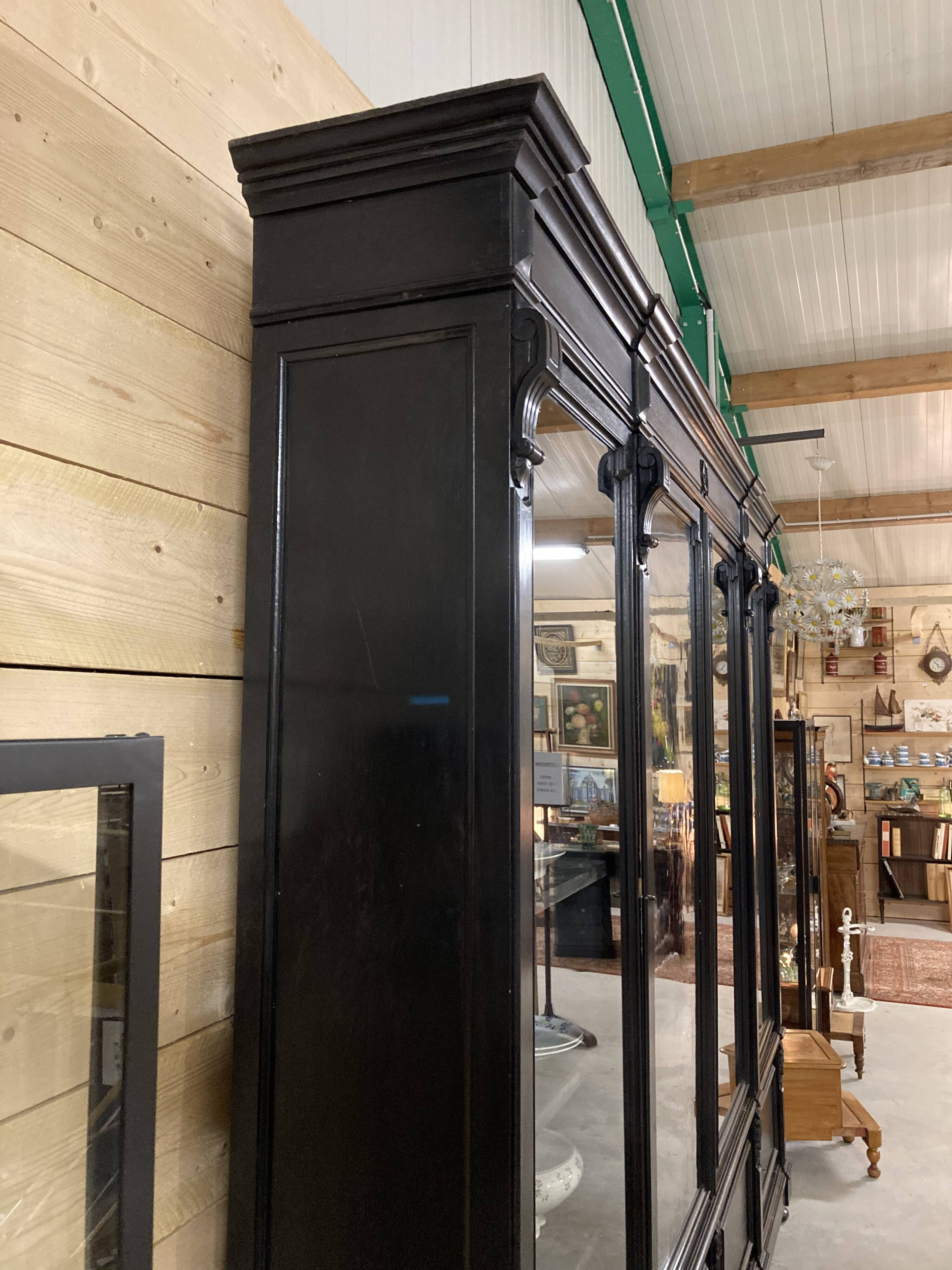 Library from the Napoléon III era in blackened pear wood.