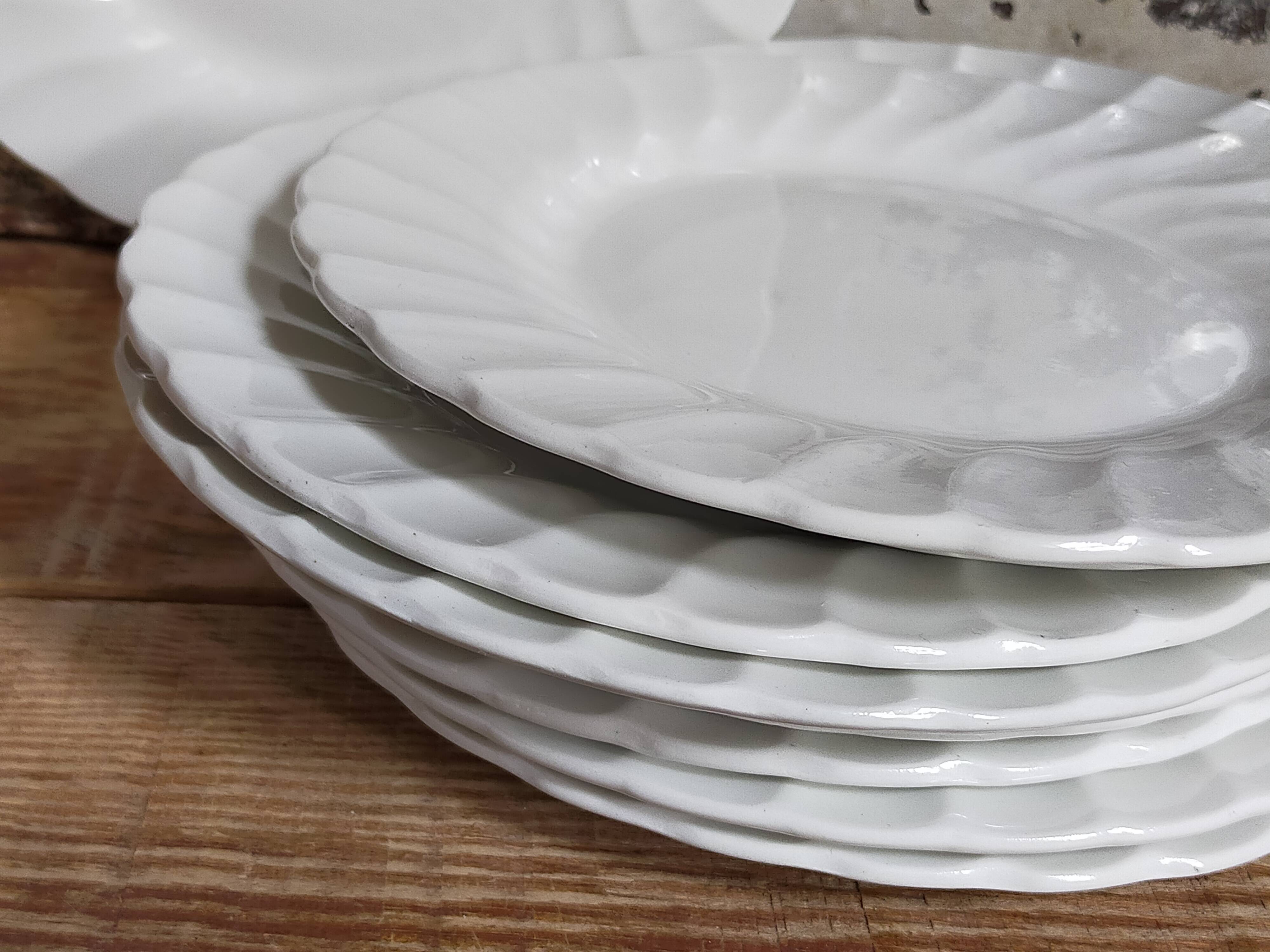 Nine fine English porcelain sweet plates