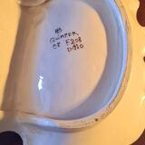 Beggar in Quimper earthenware