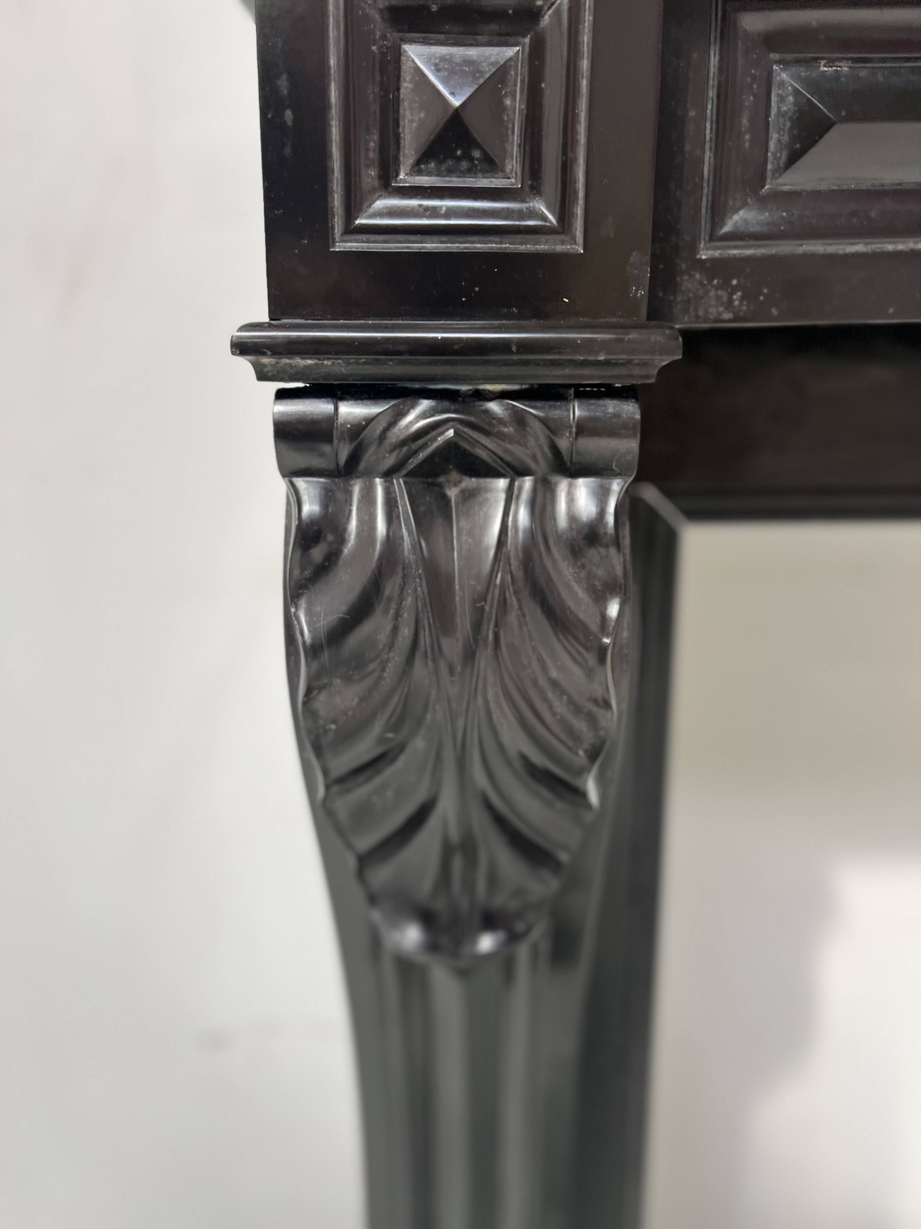 Napoleon III fireplace with claw feet in black marble, 19th century