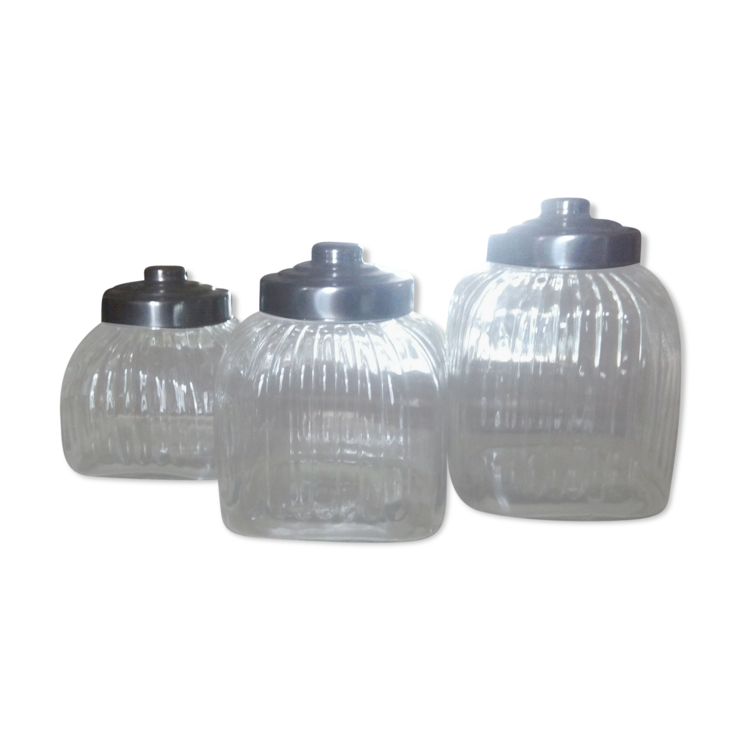 three large glass jars