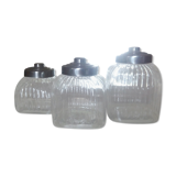 three large glass jars