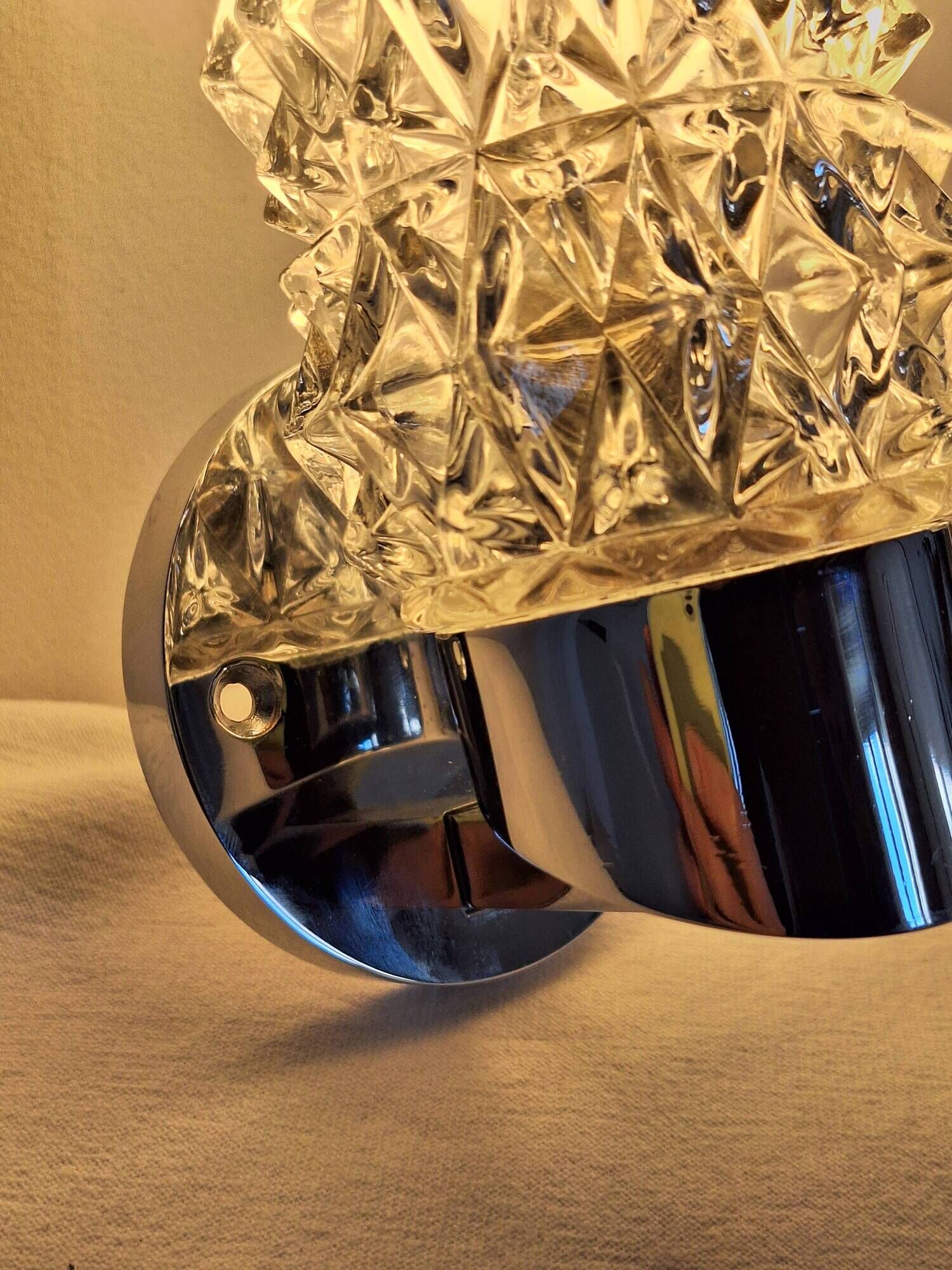 Pair of vintage Art Deco space age chrome and molded glass wall sconces