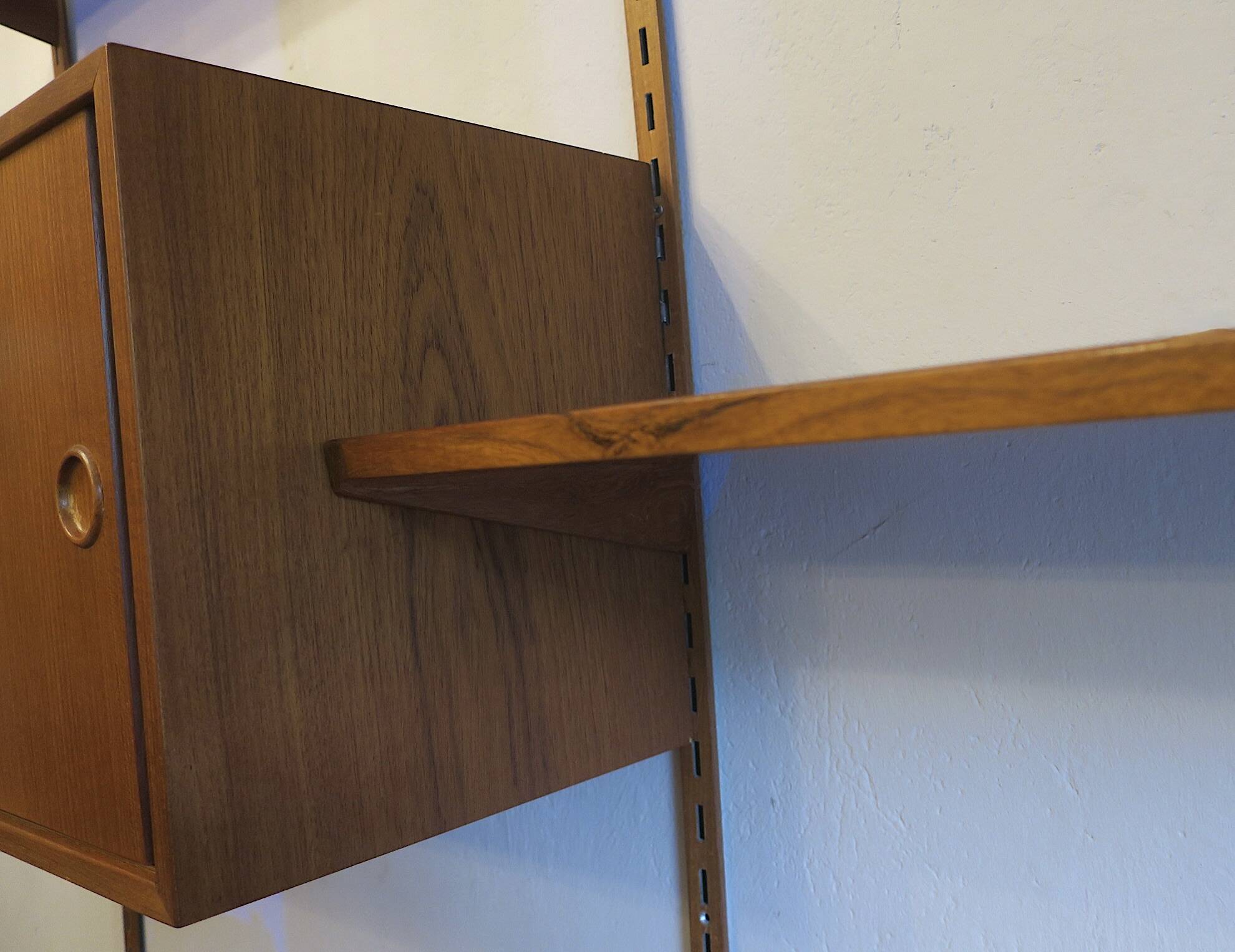 Modular 3-compartment teak wall shelving system with desk and lighting by Kai Kristiansen for FM, Denmark, 1960s