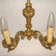 pair of bronze wall lights with 2 arms