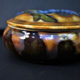 Old candy maker in glossy porcelain