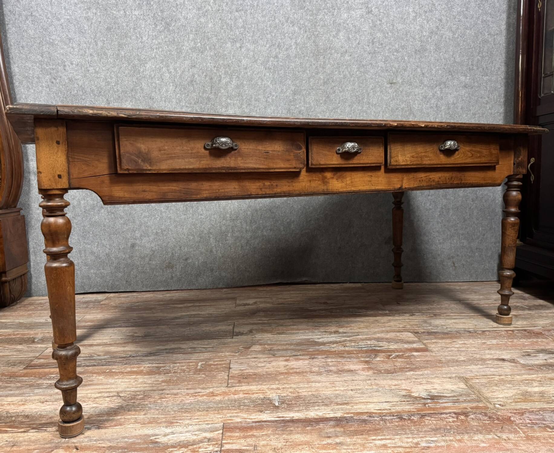 Large table or desk from the Louis Philippe period in solid wood around 1830.