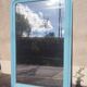 Large Louis-Philippe mirror from the 19th century in wood and stucco with a turquoise blue patina.