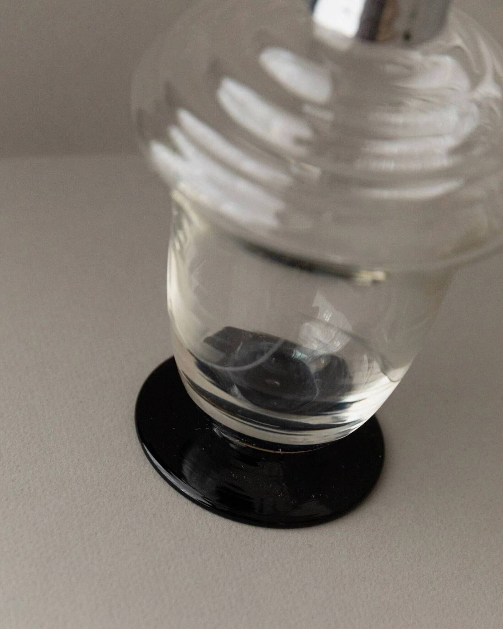 Transparent Murano glass decanter with black stopper and silver neck collar, Art Deco, 1930s Italy