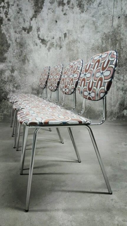 Series of four vintage italian chairs in chrome steel