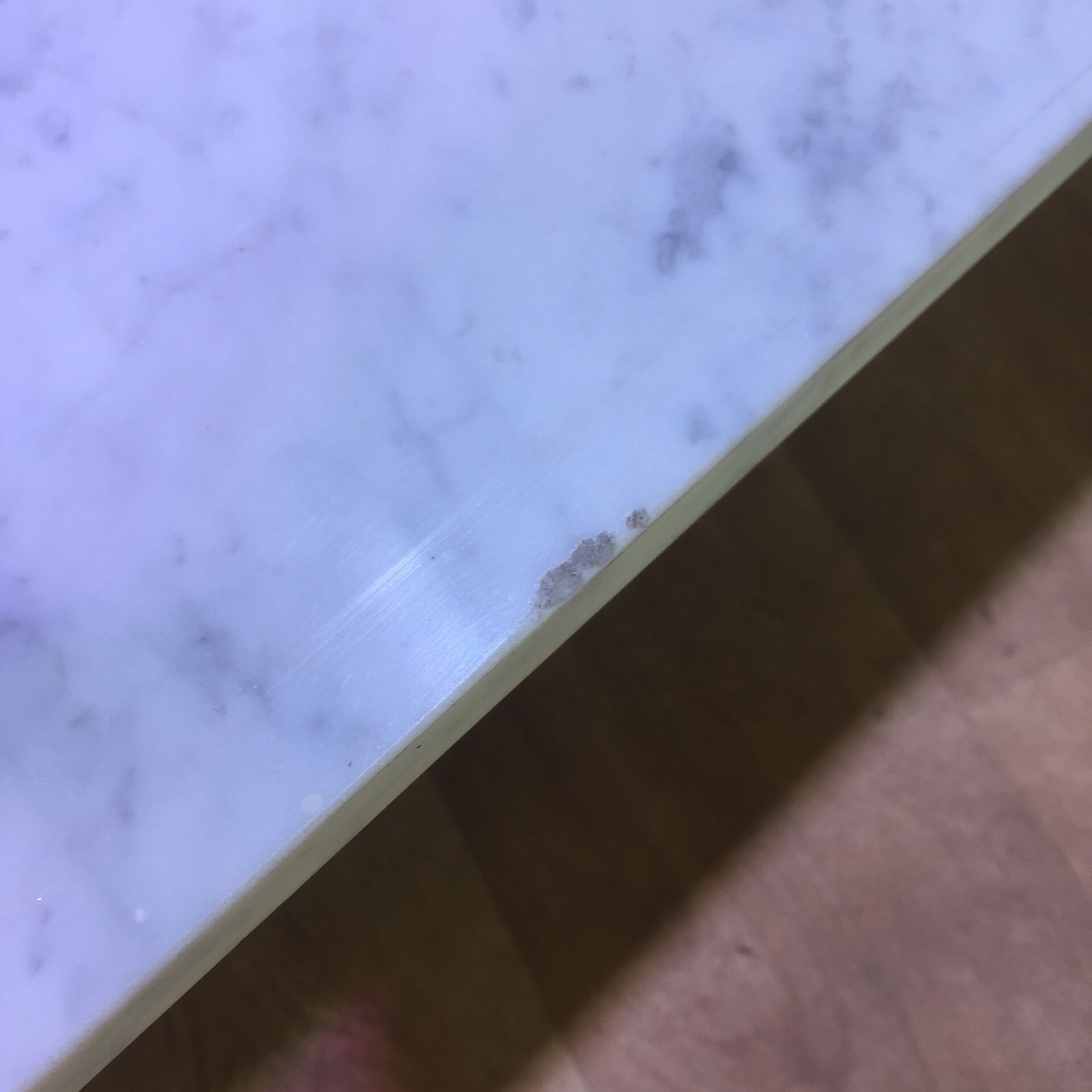 Coffee table with steel tube structure and marble top