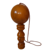 Old varnished wooden cup and ball game