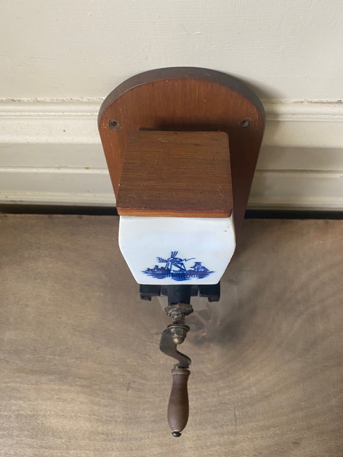 Old wall-mounted coffee grinder