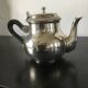 Set of teapots and milk jug.