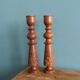 Bohemian candle holders made of turned and carved wood.