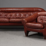 Sofa and a caramel leather armchair