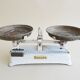 Antique kitchen scales from a record to five kilos, white beam scales with brass plates