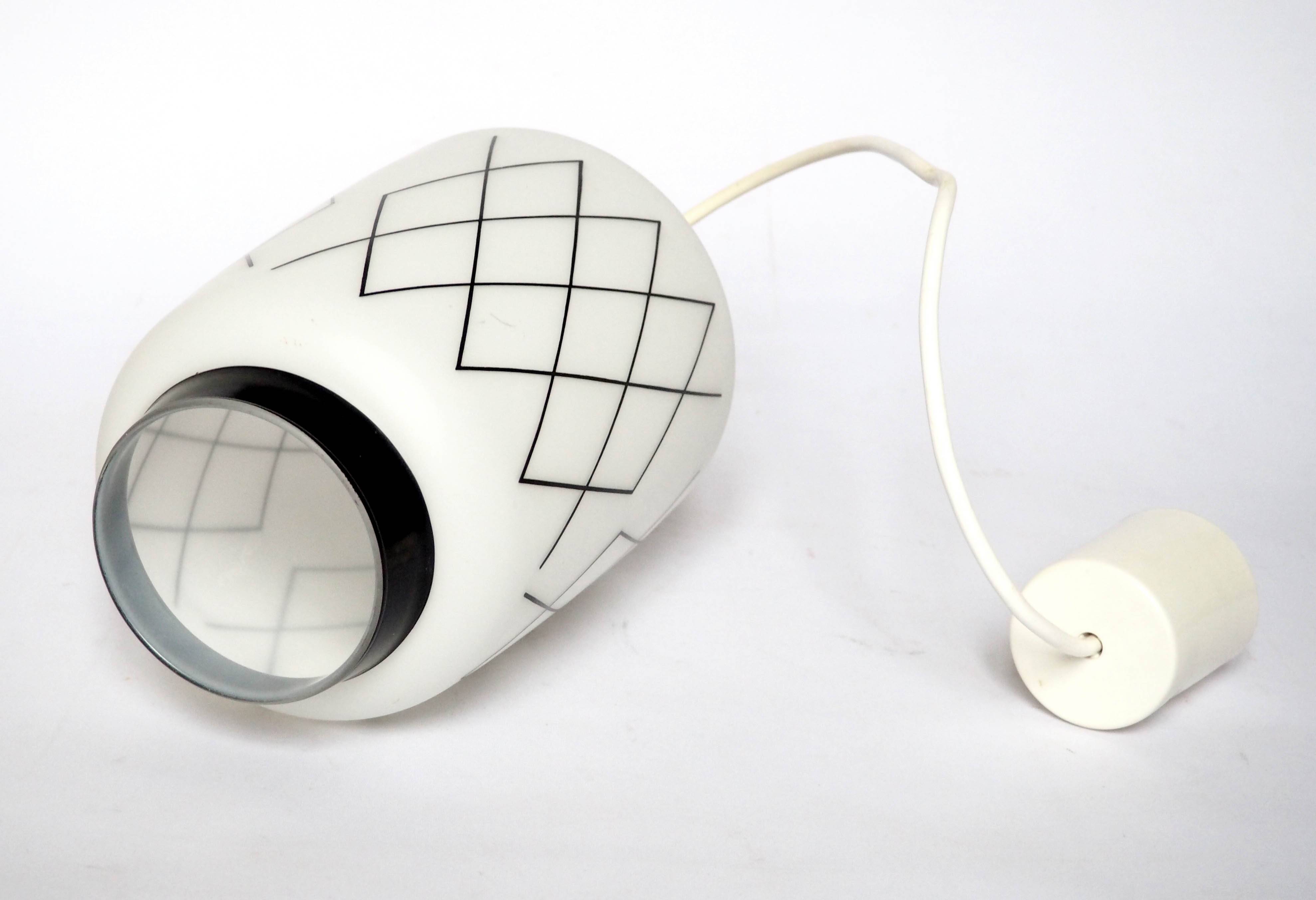 Black and white lantern suspension