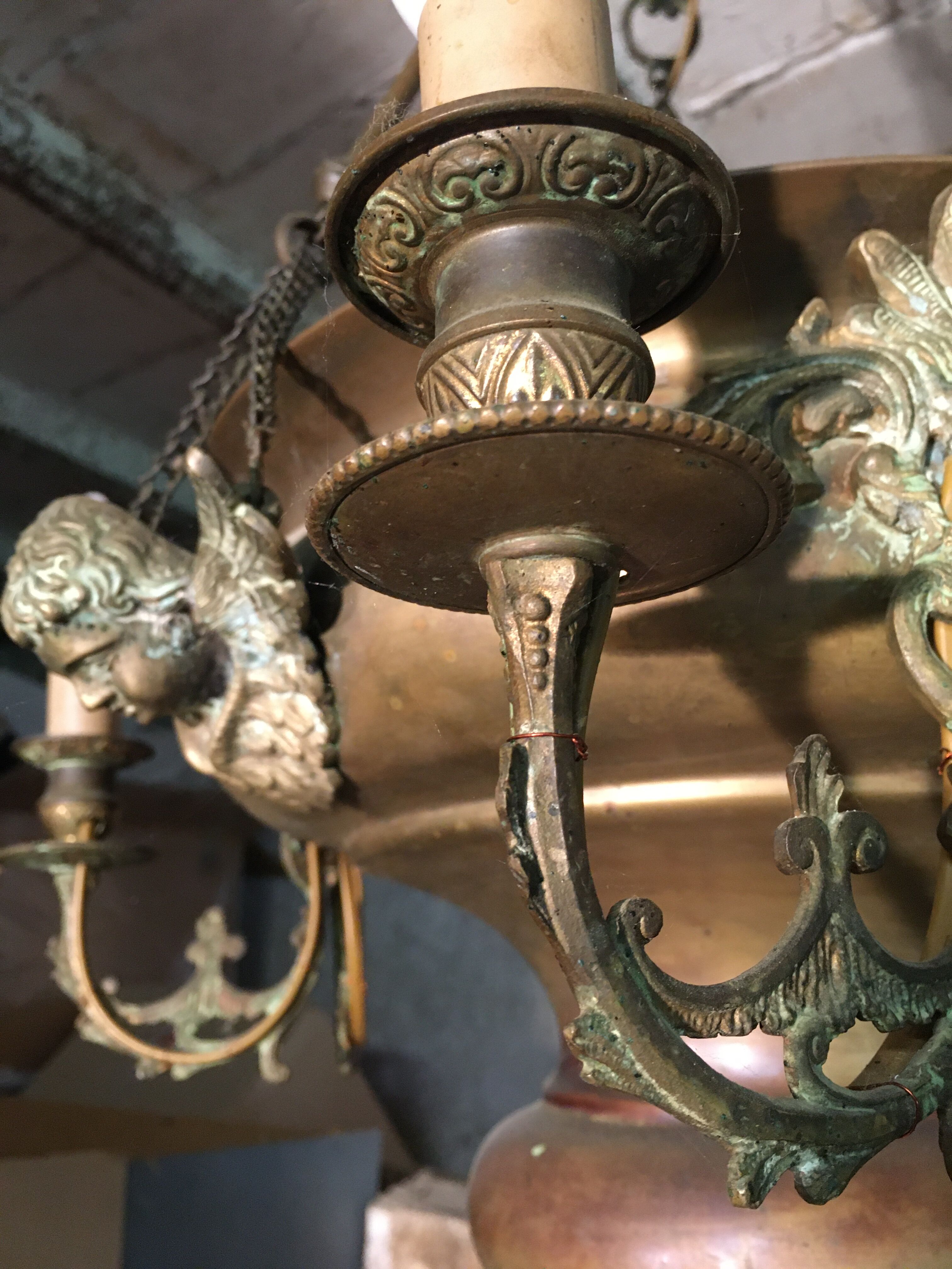 Brass chandelier with angels
