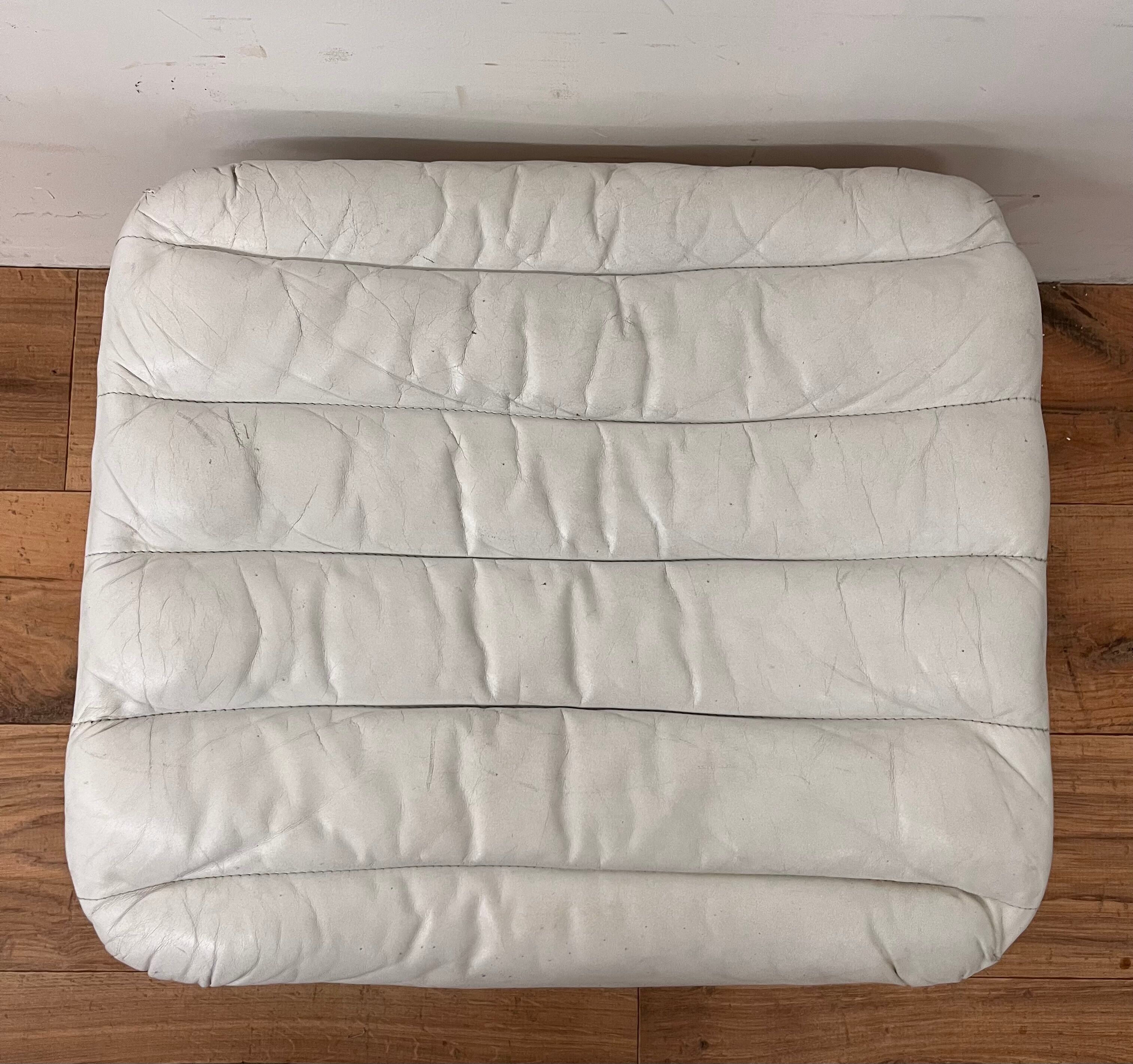 Pulkka armchair by Ilmaria Lappalainen and its ottoman