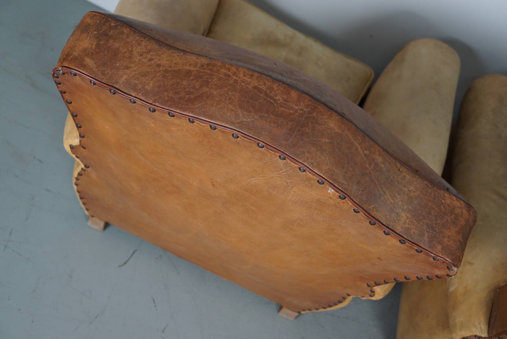 Pair of French Cognac Moustache Back Leather Club Chairs, 1940s