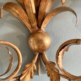 Wall lamp in gilded brass with a daisy design.